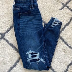 Ripped blue jeans